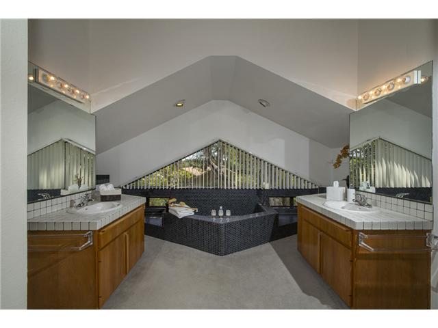 4920 Rancho Grande Del Mar, CA 92014 - Photo 22 of 25 Dramatic designs a carried throughout this elegant contemporary. The master has a large soaking tub and separate shower.