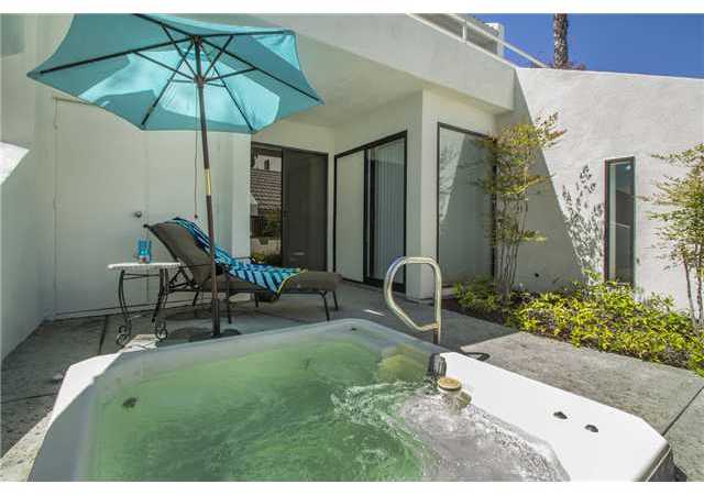 4920 Rancho Grande Del Mar, CA 92014 - Photo 5 of 25 The Intimate patio and spa sits off two of the bedrooms for privacy.