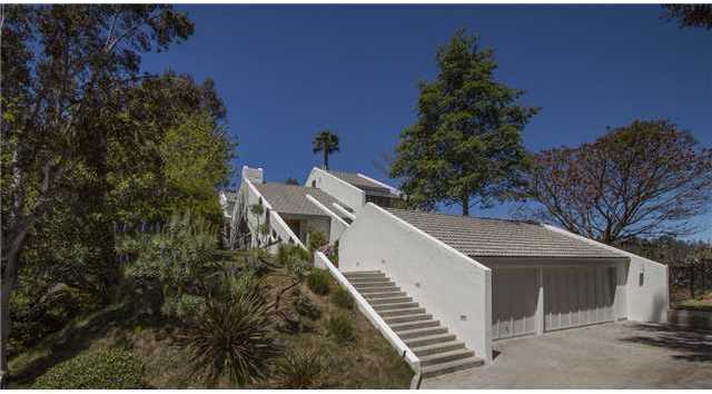 4920 Rancho Grande Del Mar, CA 92014 - Photo 6 of 25 This private hillside home is on one a one a one acre cul-de-sac with panoramic views for miles. This signature home was Designed by well known and respected Ken Ronchetti, one of the most innovative and passionate architectural designers!