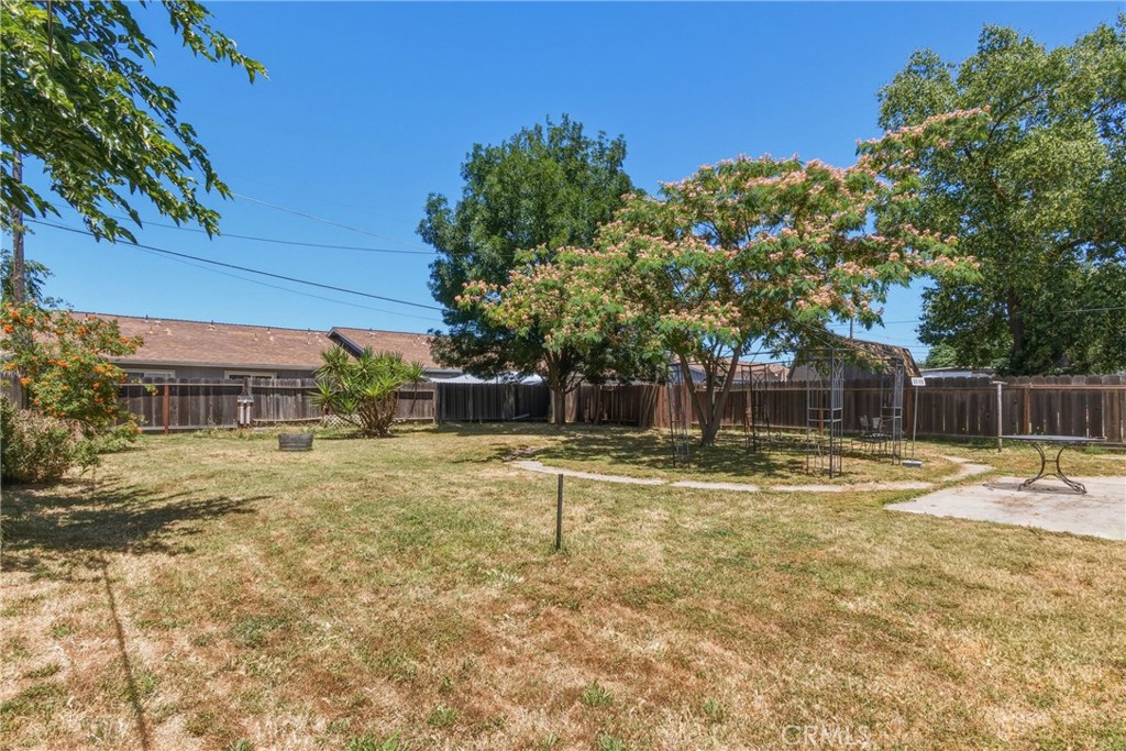 6812 Helton Street Winton, CA 95388 - Photo 23 of 24 a view of a backyard with swimming pool
