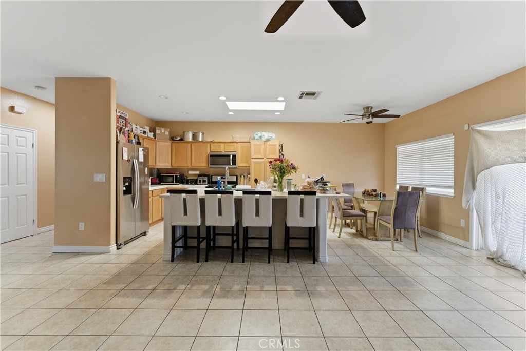 11368 Cactus Avenue Bloomington, CA 92316 - Photo 14 of 32 a group of chairs sitting in kitchen and dining room