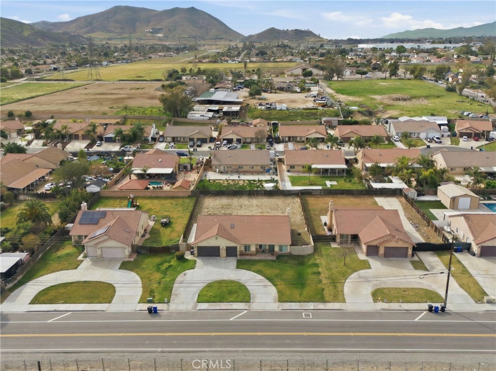 11368 Cactus Avenue Bloomington, CA 92316 - Photo 25 of 32 an aerial view of residential houses with outdoor space