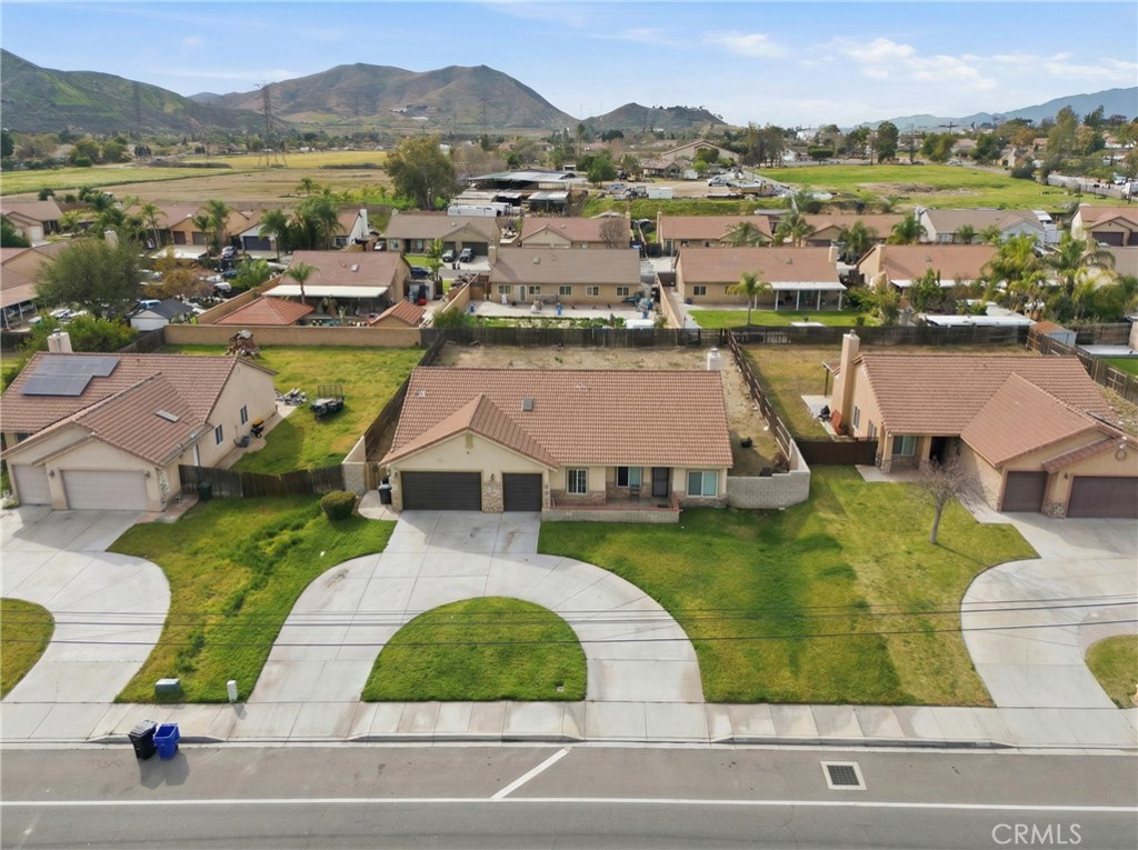 11368 Cactus Avenue Bloomington, CA 92316 - Photo 27 of 32 an aerial view of residential houses with outdoor space and river