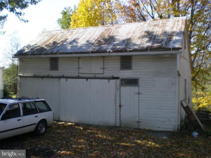 18152 Spring Run Road Dry Run, PA 17220 - Photo 18 of 29 a view of a car parked in front of a house