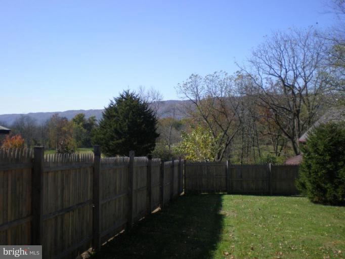 18152 Spring Run Road Dry Run, PA 17220 - Photo 21 of 29 a view of backyard with wooden fence