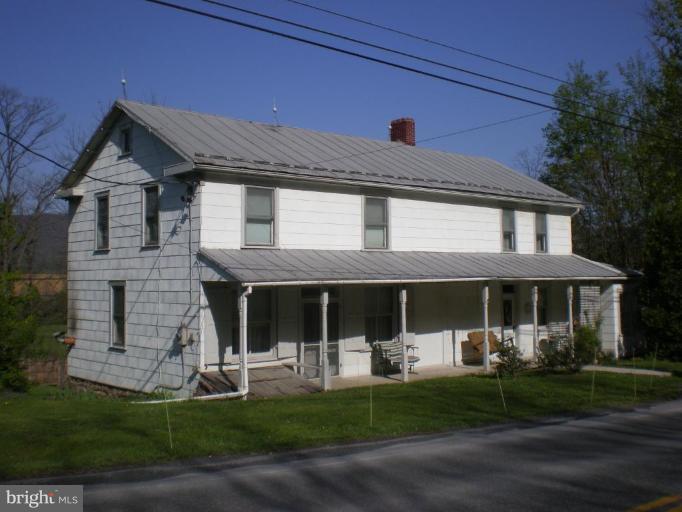 18152 Spring Run Road Dry Run, PA 17220 - Photo 25 of 29 a front view of a house with a yard
