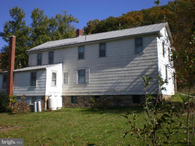 18152 Spring Run Road Dry Run, PA 17220 - Photo 26 of 29 a view of a house with a backyard