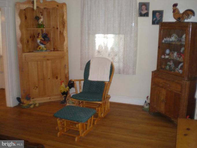 18152 Spring Run Road Dry Run, PA 17220 - Photo 5 of 29 a room with furniture and a mirror