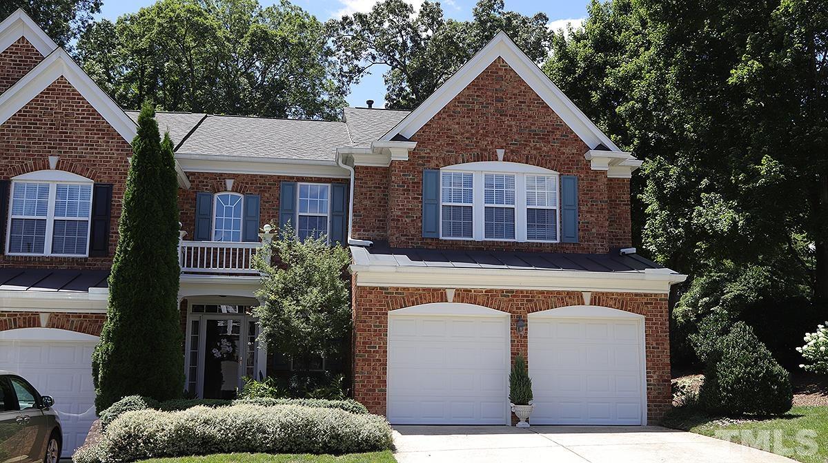 3621 Lion Ridge Court Raleigh, NC 27612 - Photo 1 of 34 a front view of a house with a yard