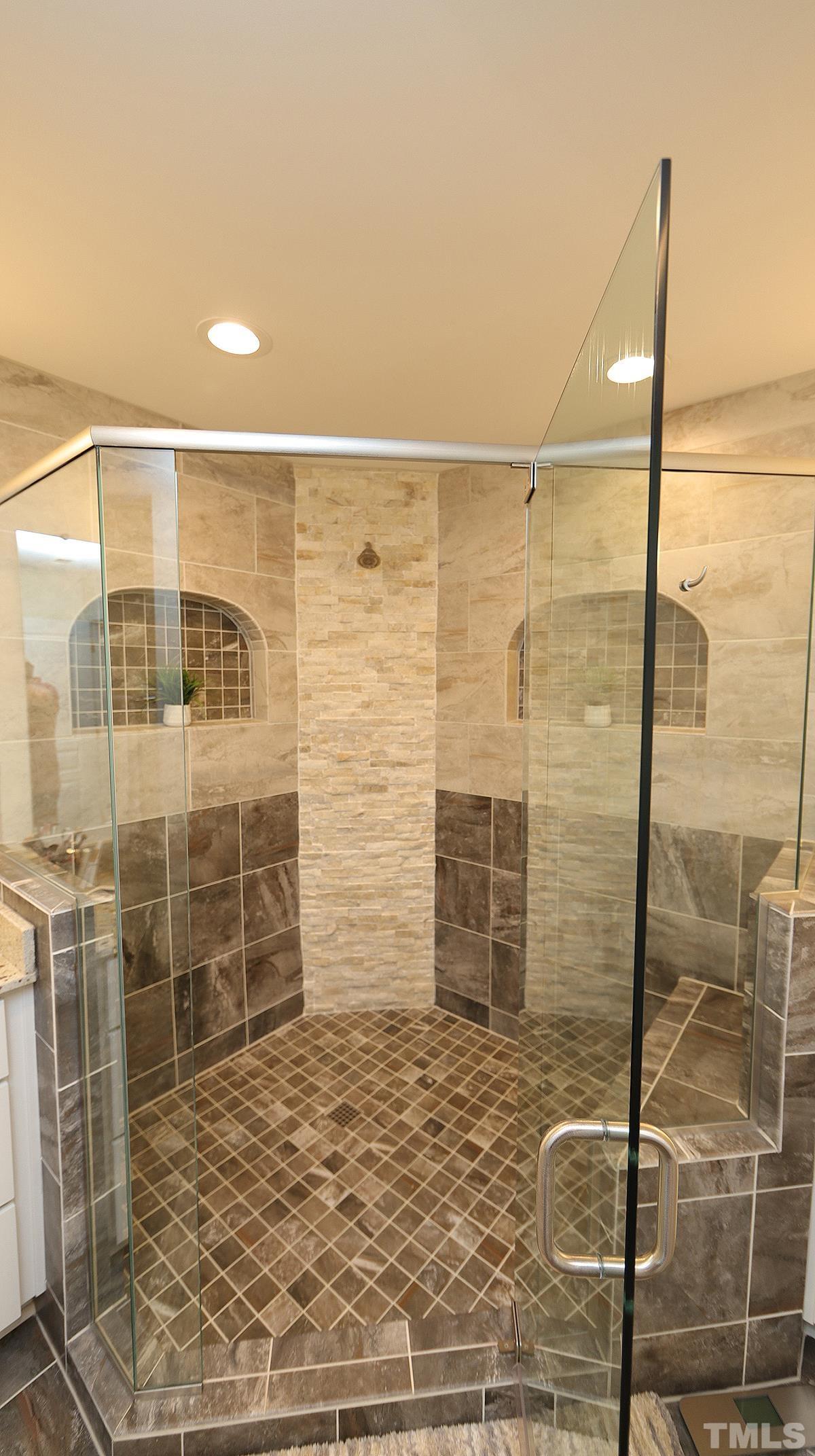 3621 Lion Ridge Court Raleigh, NC 27612 - Photo 26 of 34 a bathroom with a shower