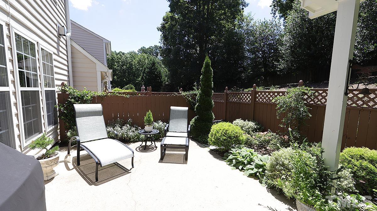 3621 Lion Ridge Court Raleigh, NC 27612 - Photo 34 of 34 a view of a chairs and table in the patio
