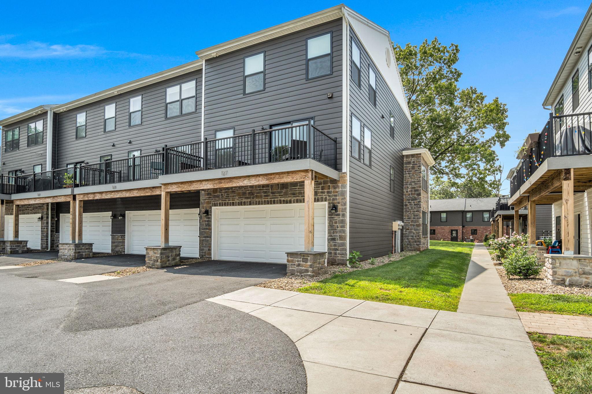 127 High Pointe Drive, Unit 31 Hummelstown, PA 17036 - Photo 27 of 28 Modern townhomes with stylish exteriors.