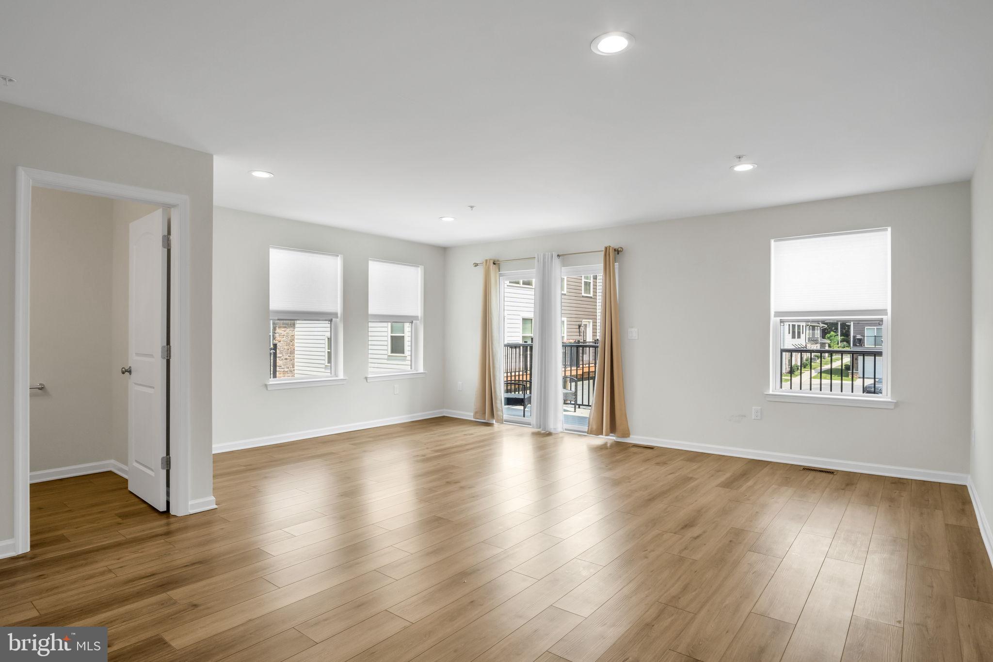 127 High Pointe Drive, Unit 31 Hummelstown, PA 17036 - Photo 6 of 28 Bright and airy open living area.