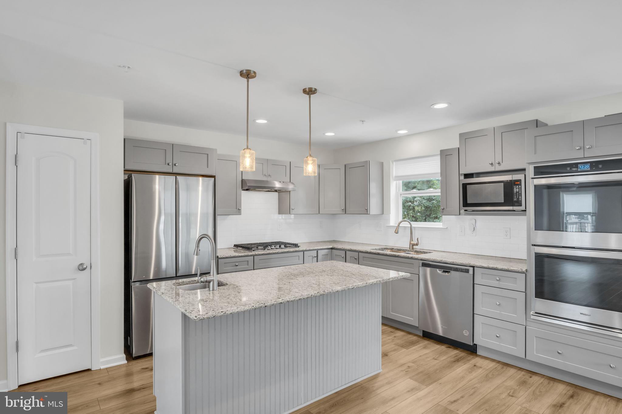 127 High Pointe Drive, Unit 31 Hummelstown, PA 17036 - Photo 10 of 28 Modern kitchen with sleek finishes.