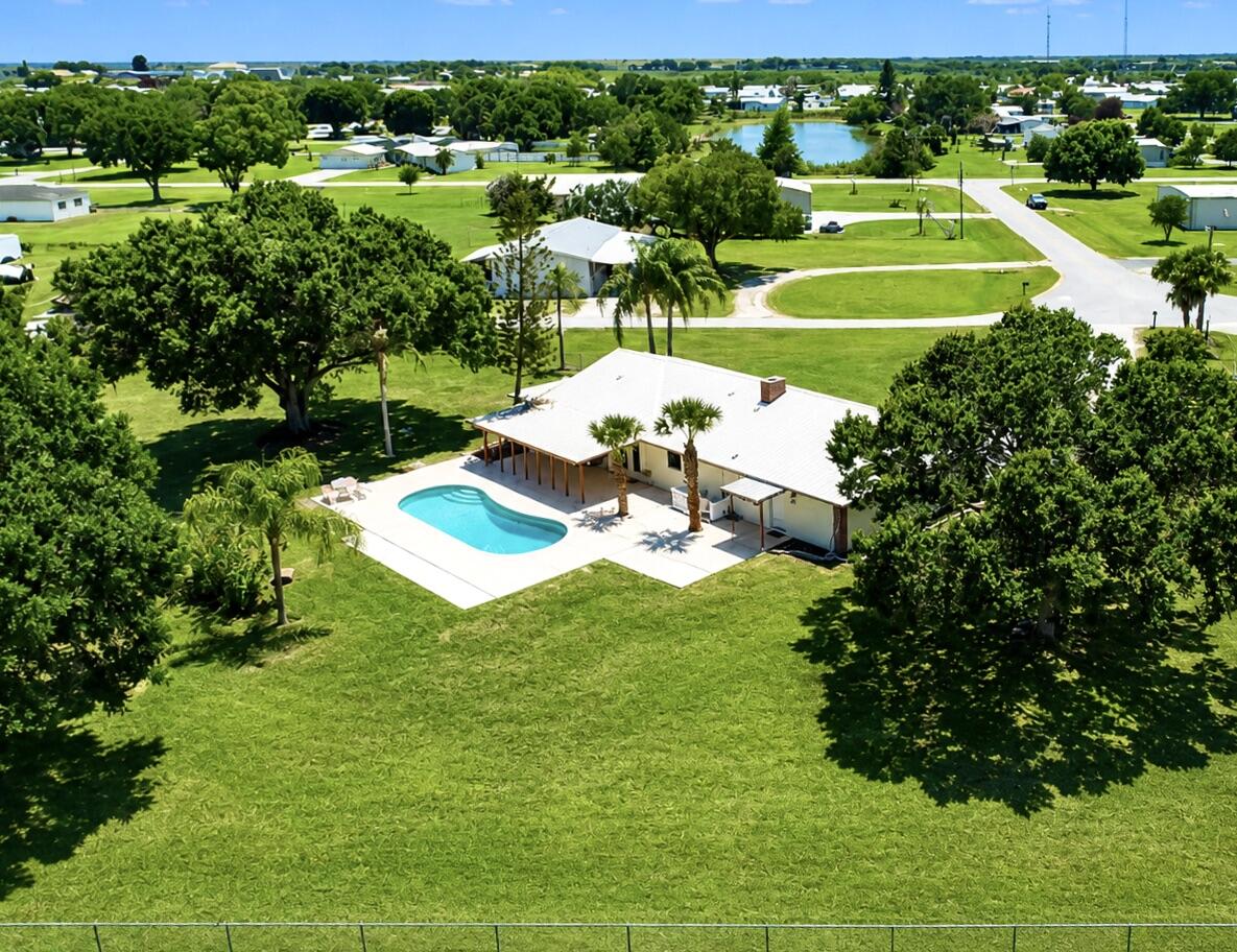3856 Southwest 11th Avenue Okeechobee, FL 34974 - Photo 3 of 42 Aerial Looking at Back Yard
