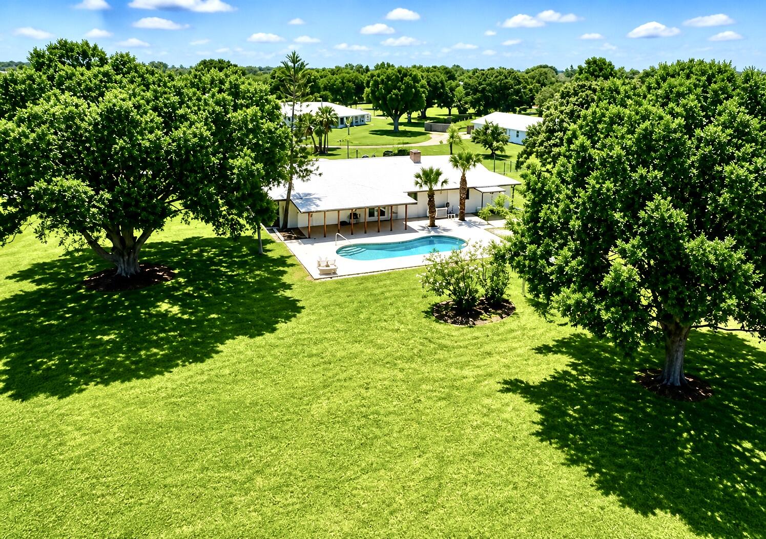 3856 Southwest 11th Avenue Okeechobee, FL 34974 - Photo 4 of 42 Aerial Looking at Back Yard