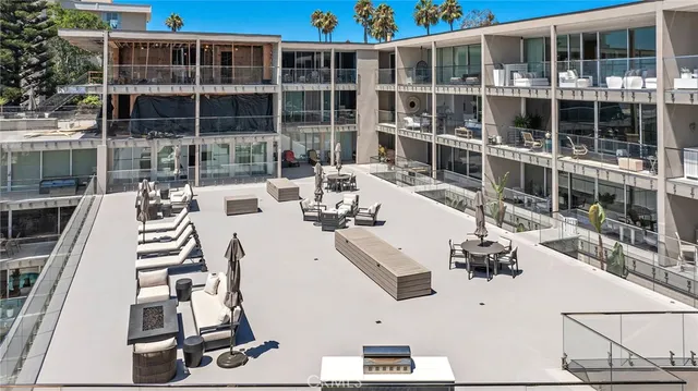 a view of a patio with swimming pool