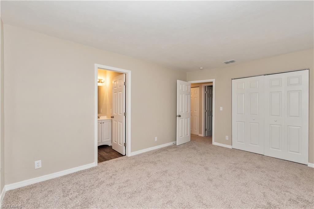 1770 52nd Terrace Southwest Naples, FL 34116 - Photo 14 of 23 a view of an empty room and closet area
