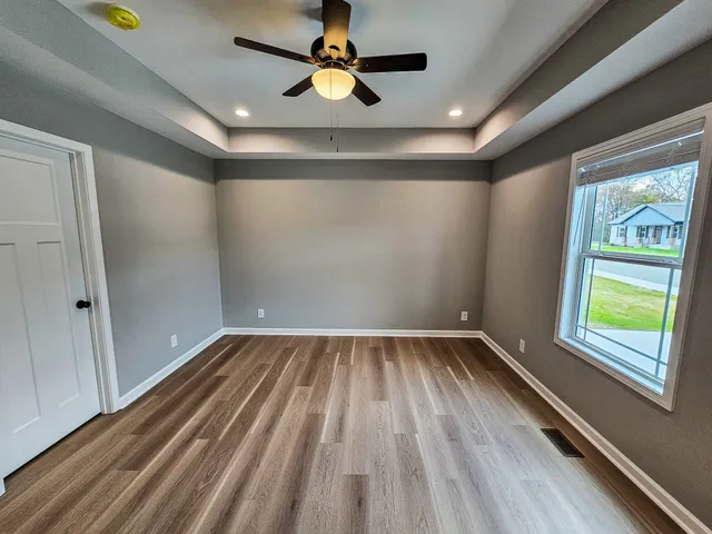 a view of an empty room and window