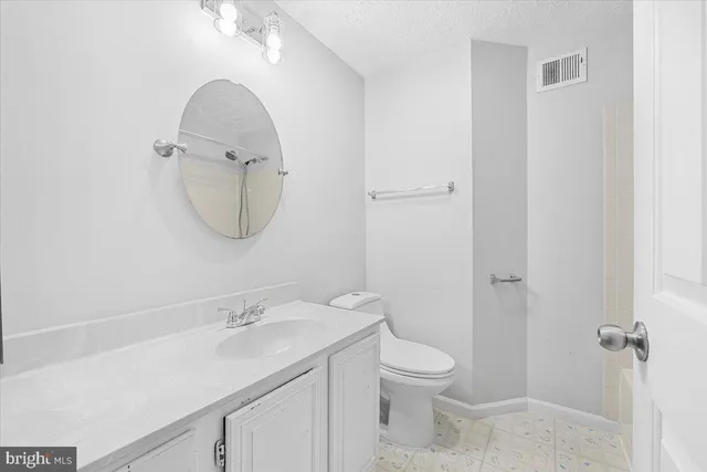 a room with a bed and window