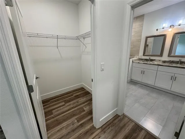 a view of a hallway with staircase