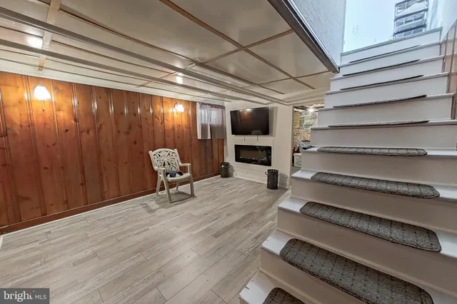 a view of livingroom with furniture wooden floor and window