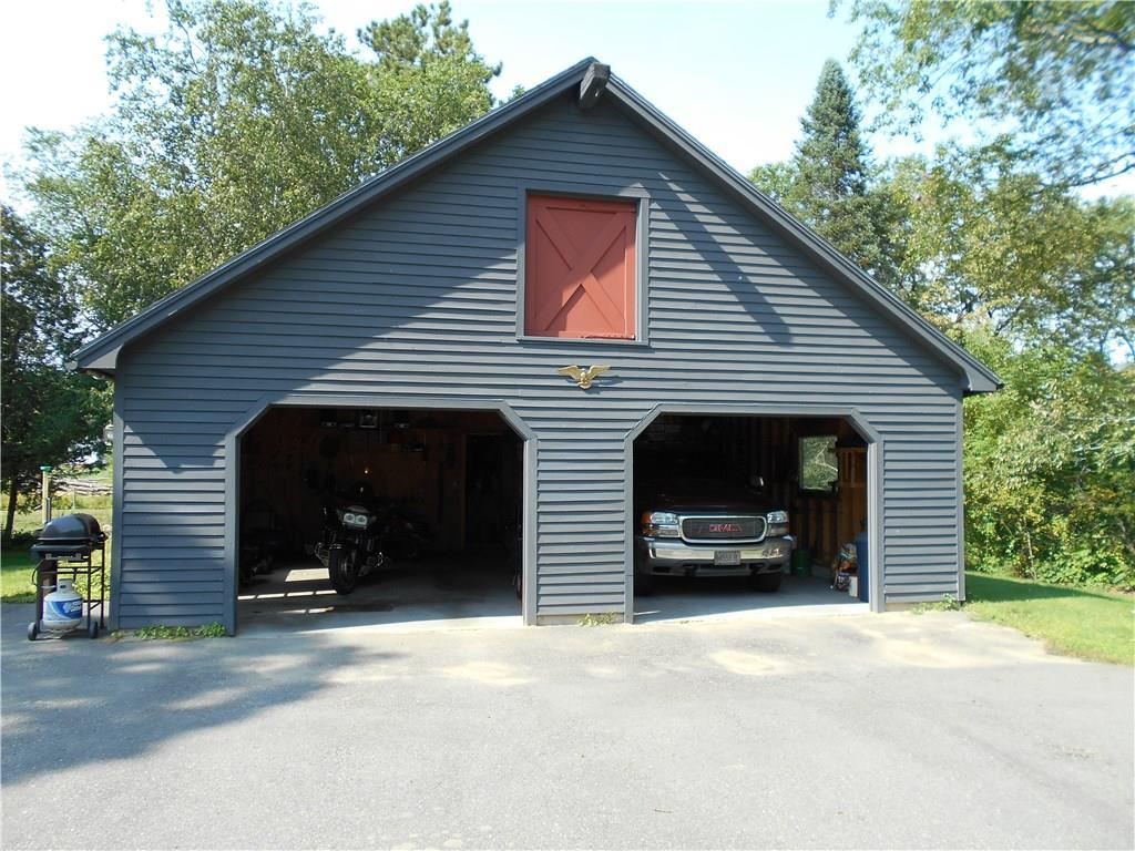 66 River Road Norridgewock, ME 04957 - Photo 7 of 33 28' X 32' two car garage with...