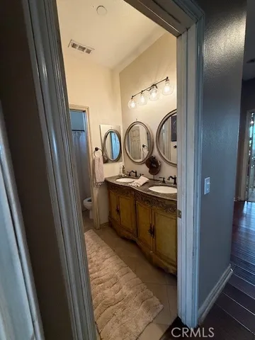 a spacious bedroom with bed and window