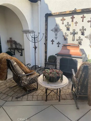 a bedroom with a bed and a mirror