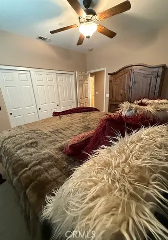 a view of a dining room with furniture wooden floor and chandelier