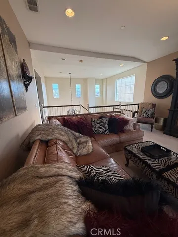 a view of a backyard with sitting area