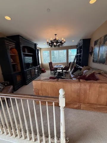 a view of a chair and table in the patio