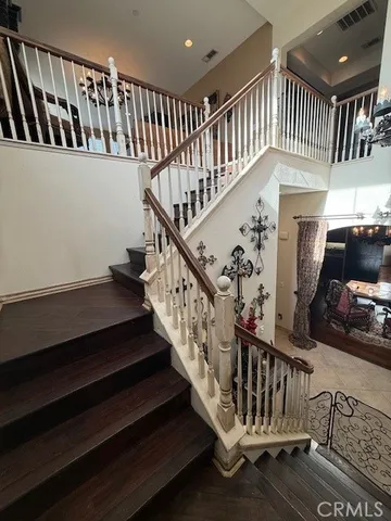 a kitchen with a sink a counter top space appliances and cabinets