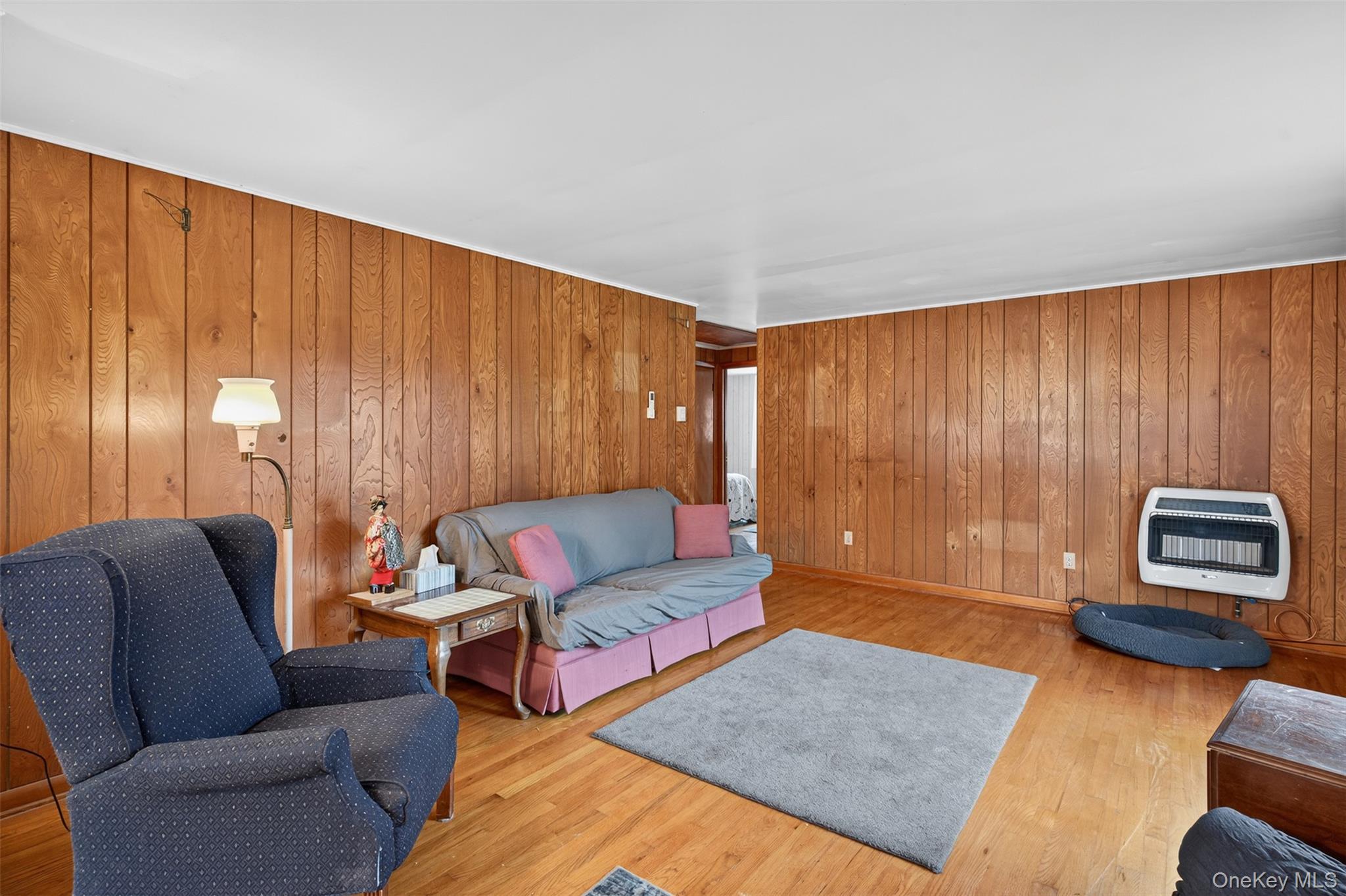 4030 Highway 209, Unit 4028 Stone Ridge, NY 12484 - Photo 3 of 22 a living room with furniture and a couch