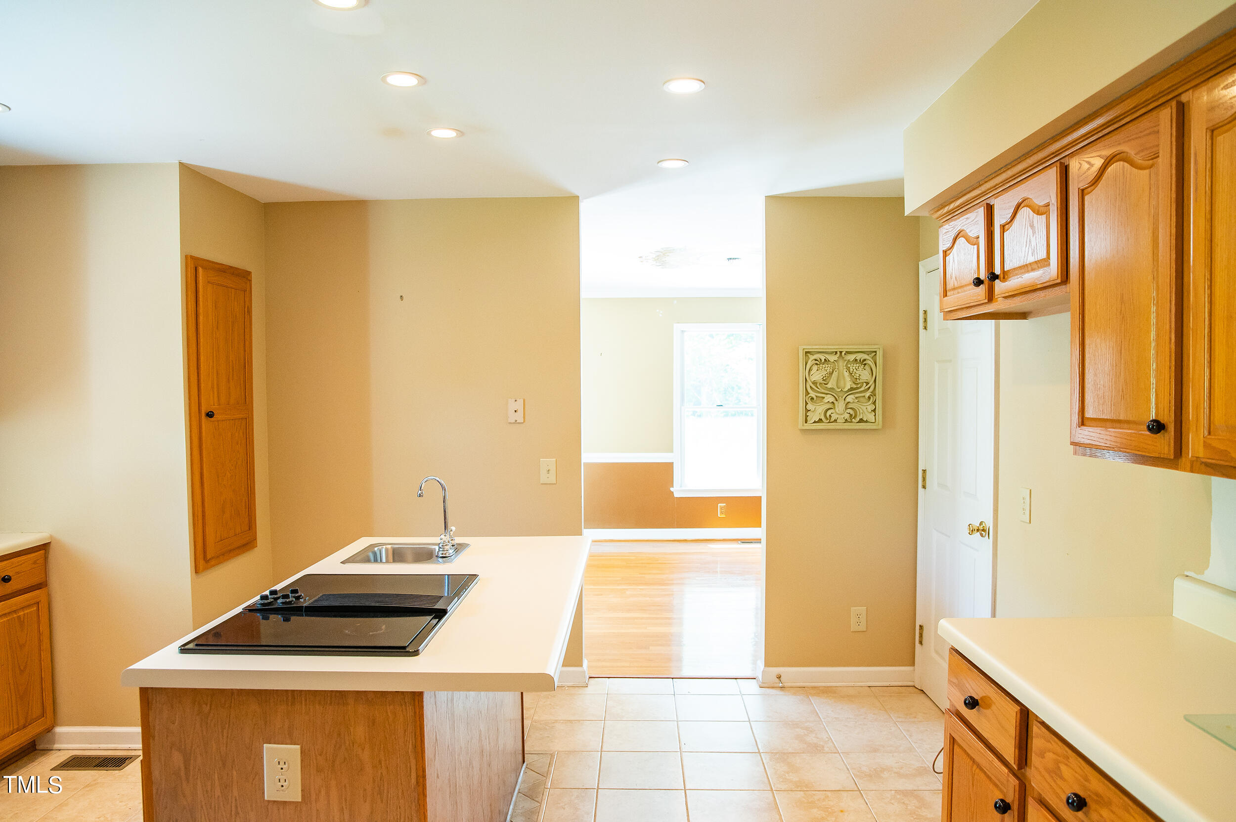 5 Banbury Drive Roxboro, NC 27573 - Photo 12 of 66 a kitchen that has a sink and a stove in it