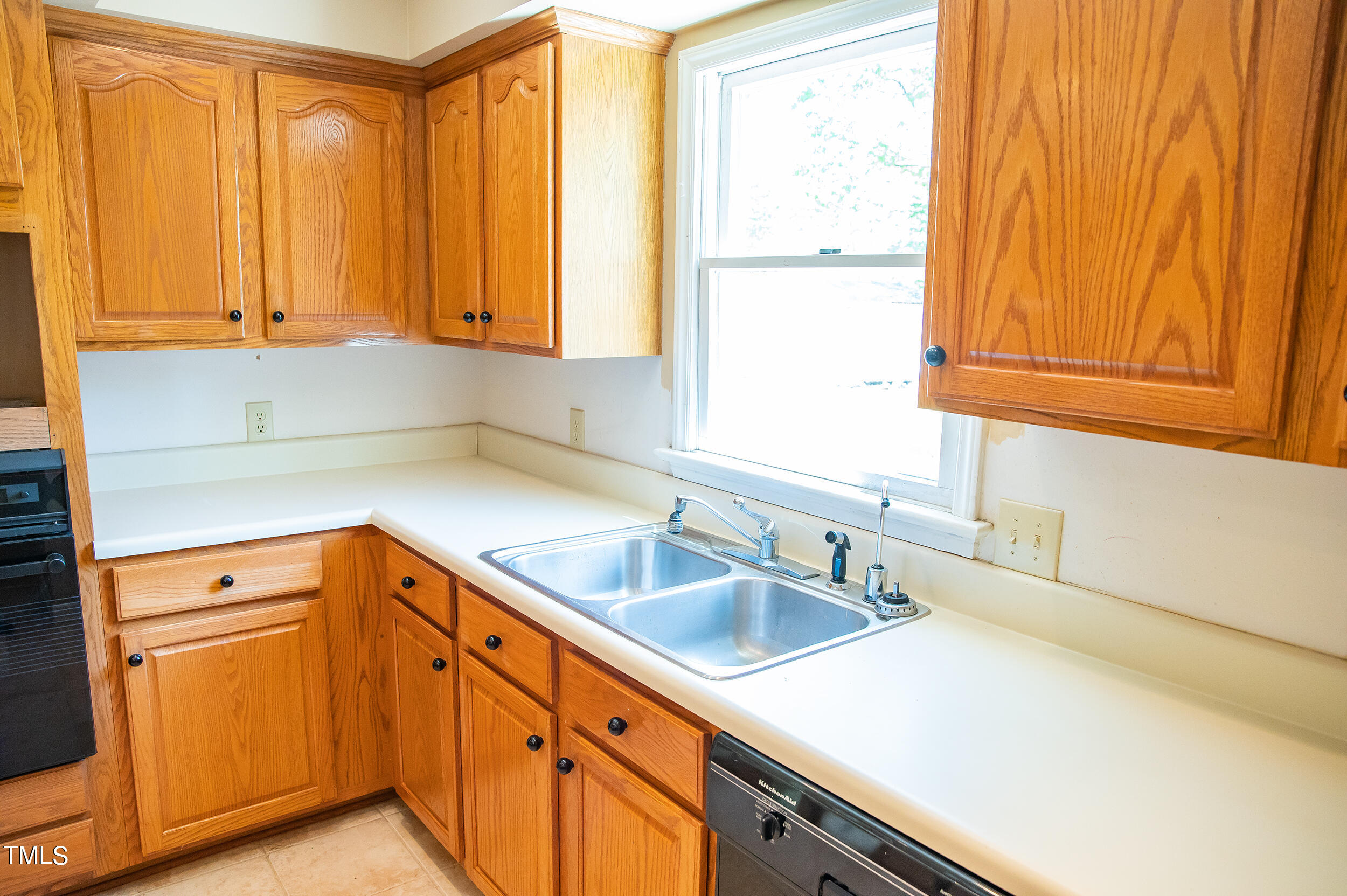 5 Banbury Drive Roxboro, NC 27573 - Photo 17 of 66 a kitchen with granite countertop white cabinets and sink