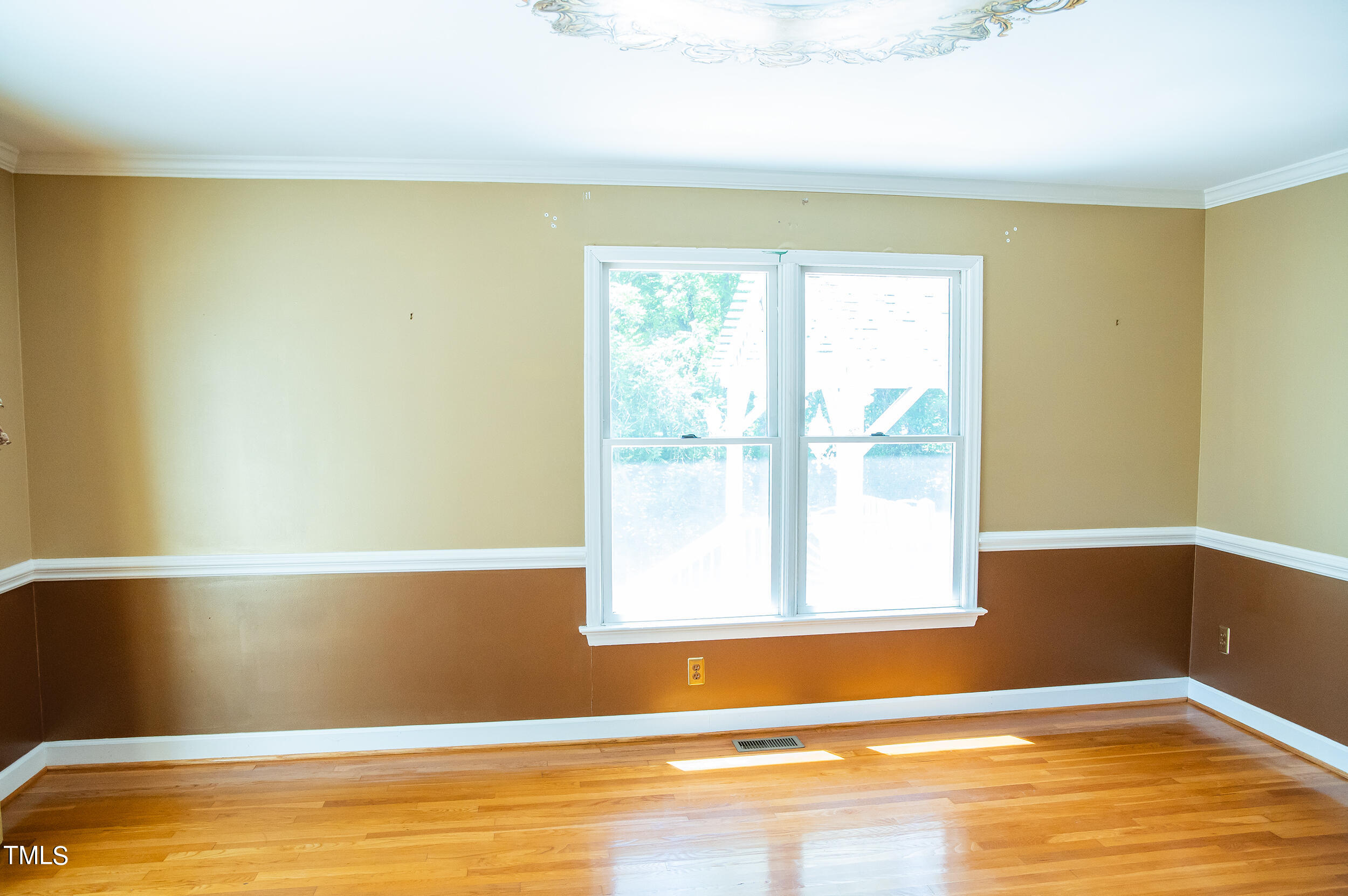 5 Banbury Drive Roxboro, NC 27573 - Photo 23 of 66 a view of a room with window and a wooden floor