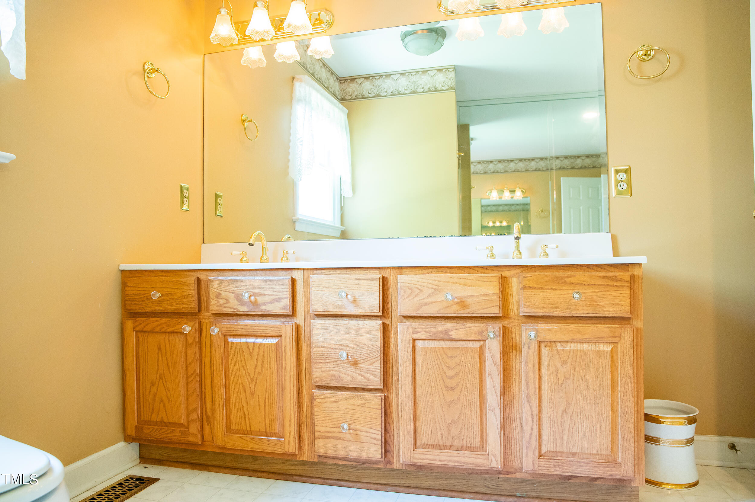 5 Banbury Drive Roxboro, NC 27573 - Photo 36 of 66 a bathroom with a granite countertop sink and a mirror