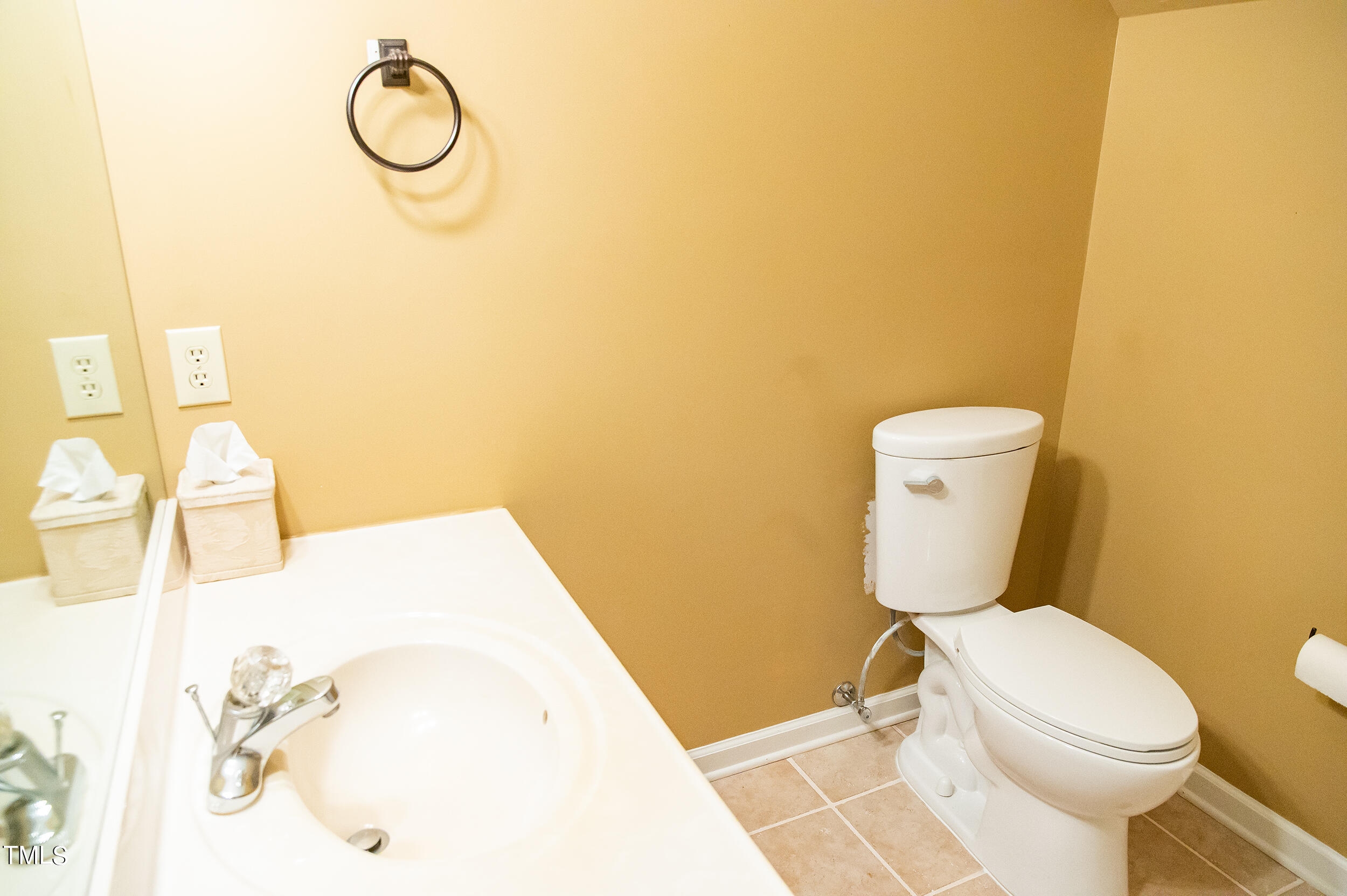 5 Banbury Drive Roxboro, NC 27573 - Photo 40 of 66 a white toilet sitting next to a bathroom sink