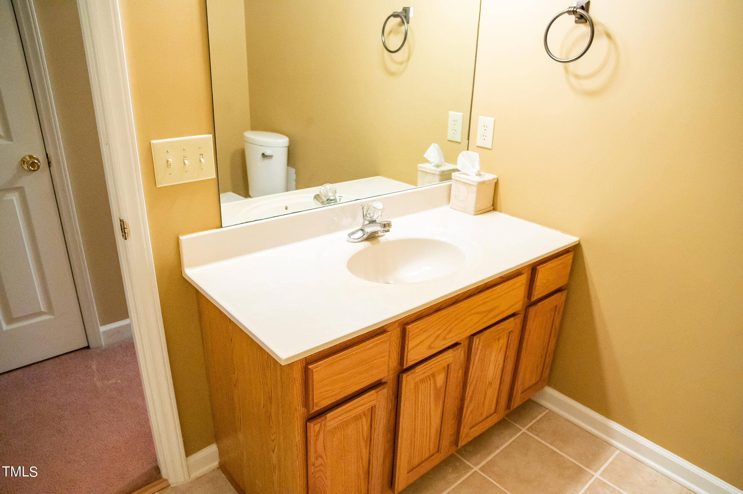 5 Banbury Drive Roxboro, NC 27573 - Photo 42 of 66 a bathroom with a sink and a mirror