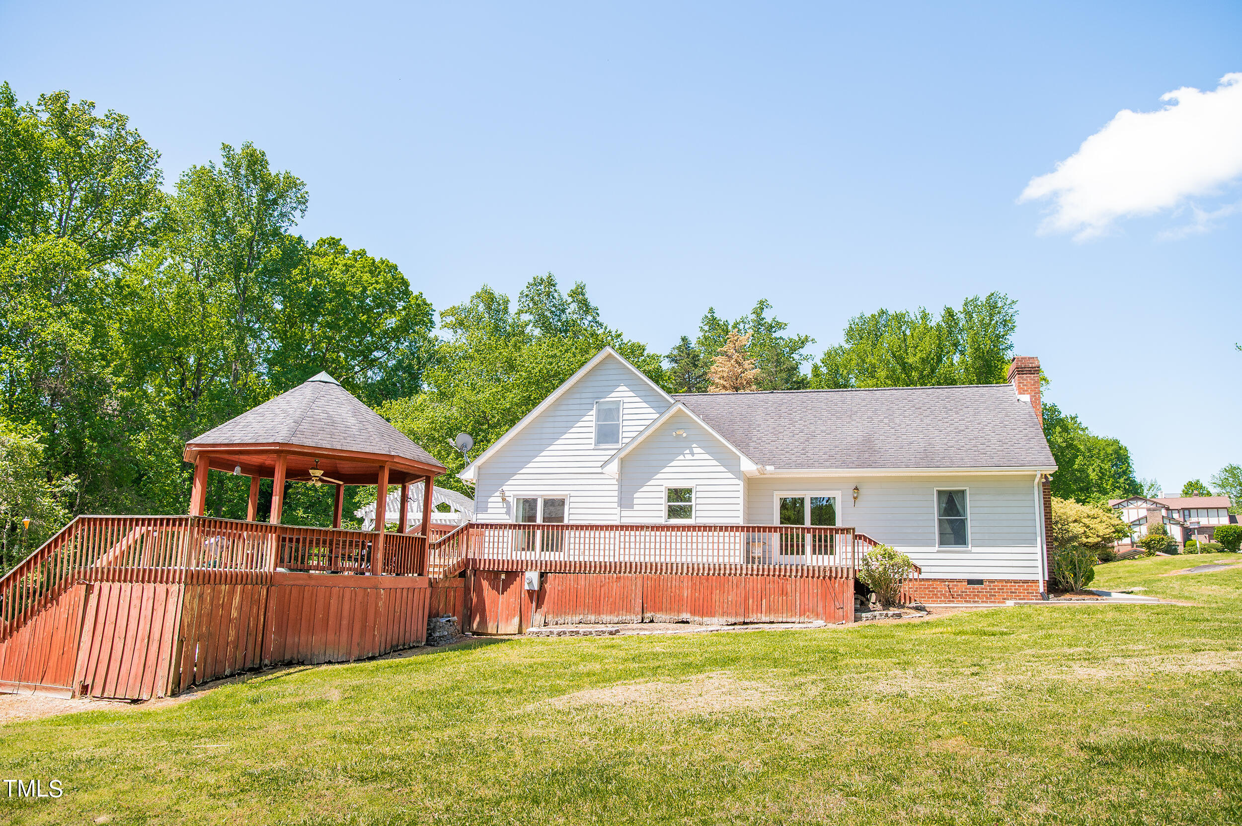 5 Banbury Drive Roxboro, NC 27573 - Photo 64 of 66 a front view of a house with yard and green space