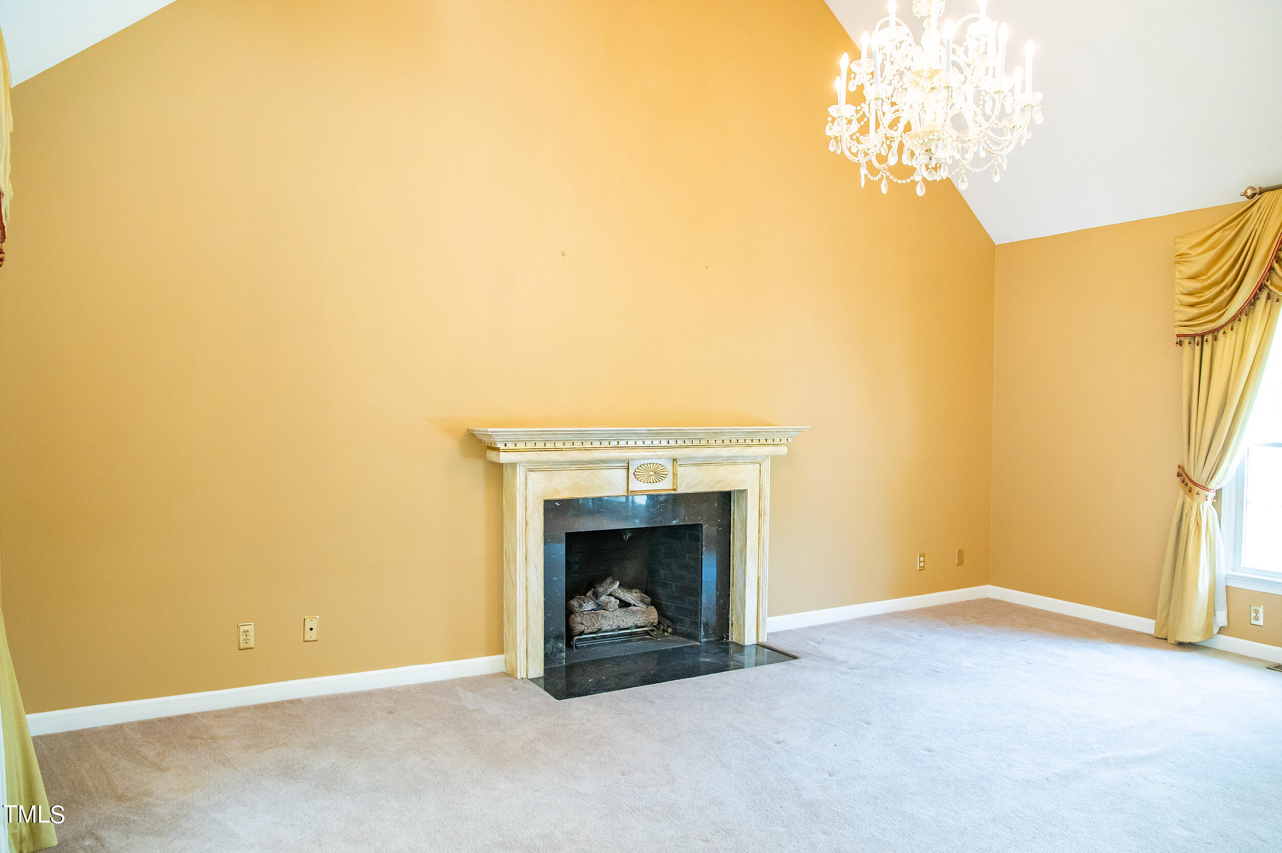 5 Banbury Drive Roxboro, NC 27573 - Photo 8 of 66 a view of an empty room with a fireplace