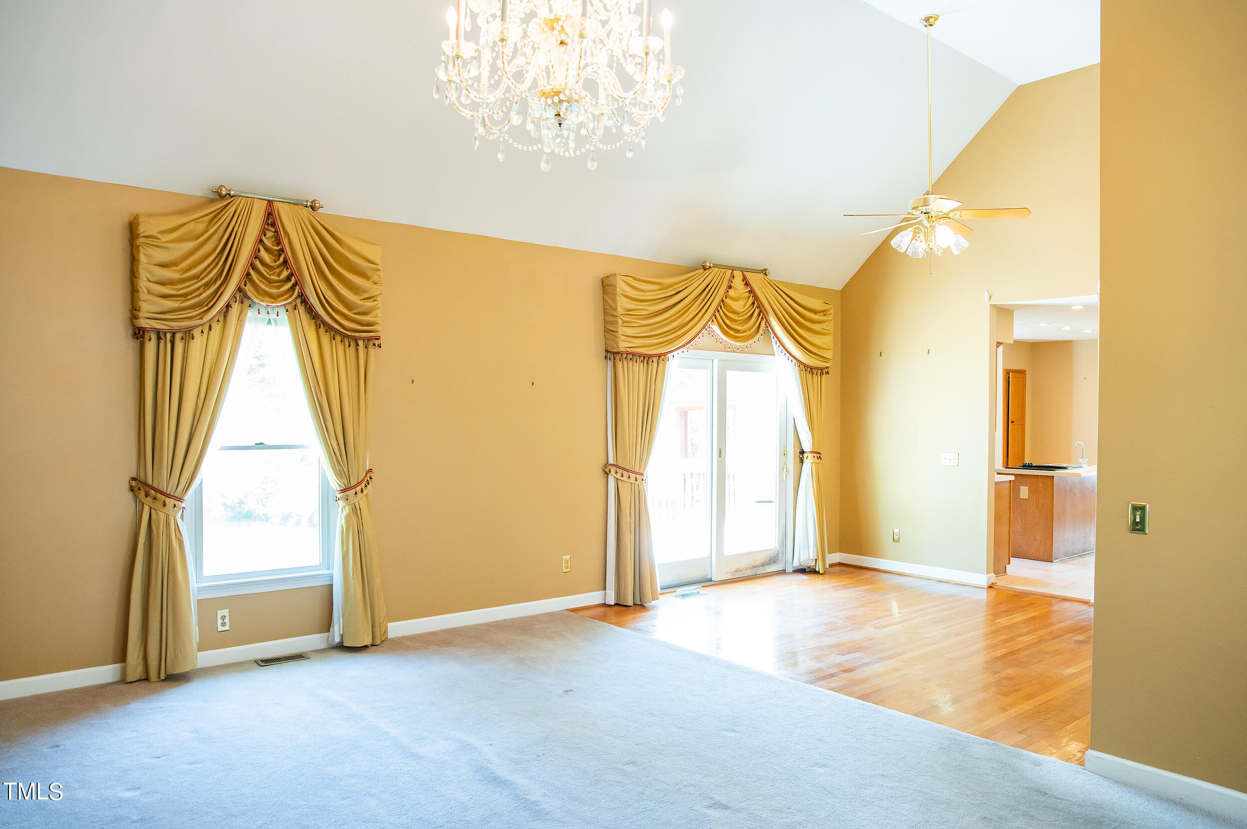 5 Banbury Drive Roxboro, NC 27573 - Photo 10 of 66 a view of a room with a window and chandelier