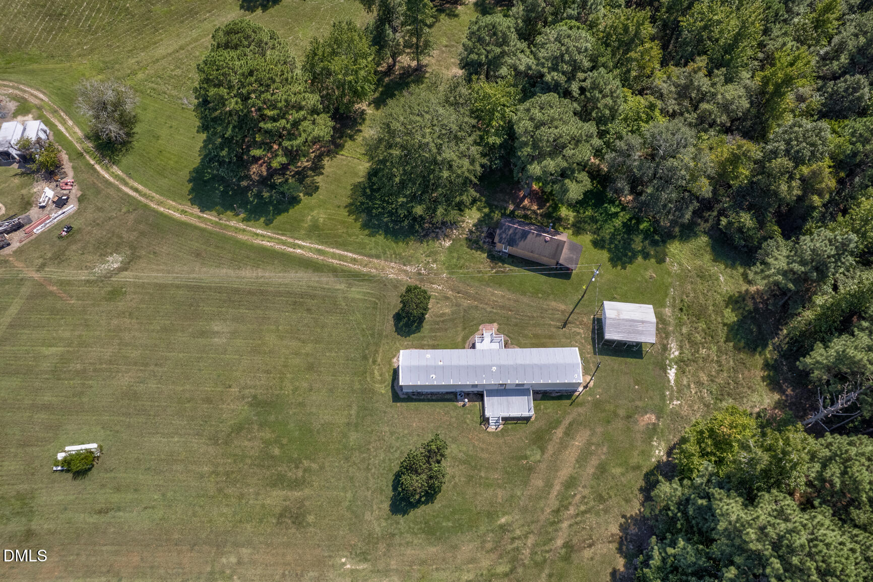 6515 Tonya Road Elm City, NC 27822 - Photo 50 of 52 an aerial view of a house with a yard