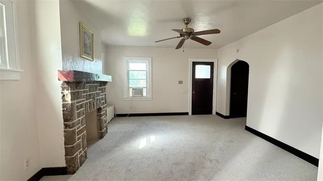 a view of a livingroom with a fireplace