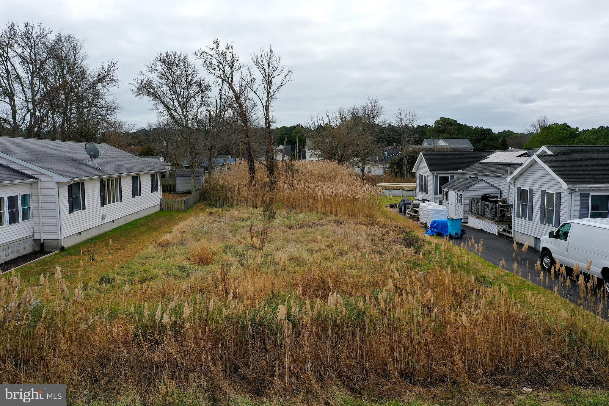 12434 Windsor Road Ocean City, MD 21842 - Photo 8 of 8 a view of a house with a wooden deck