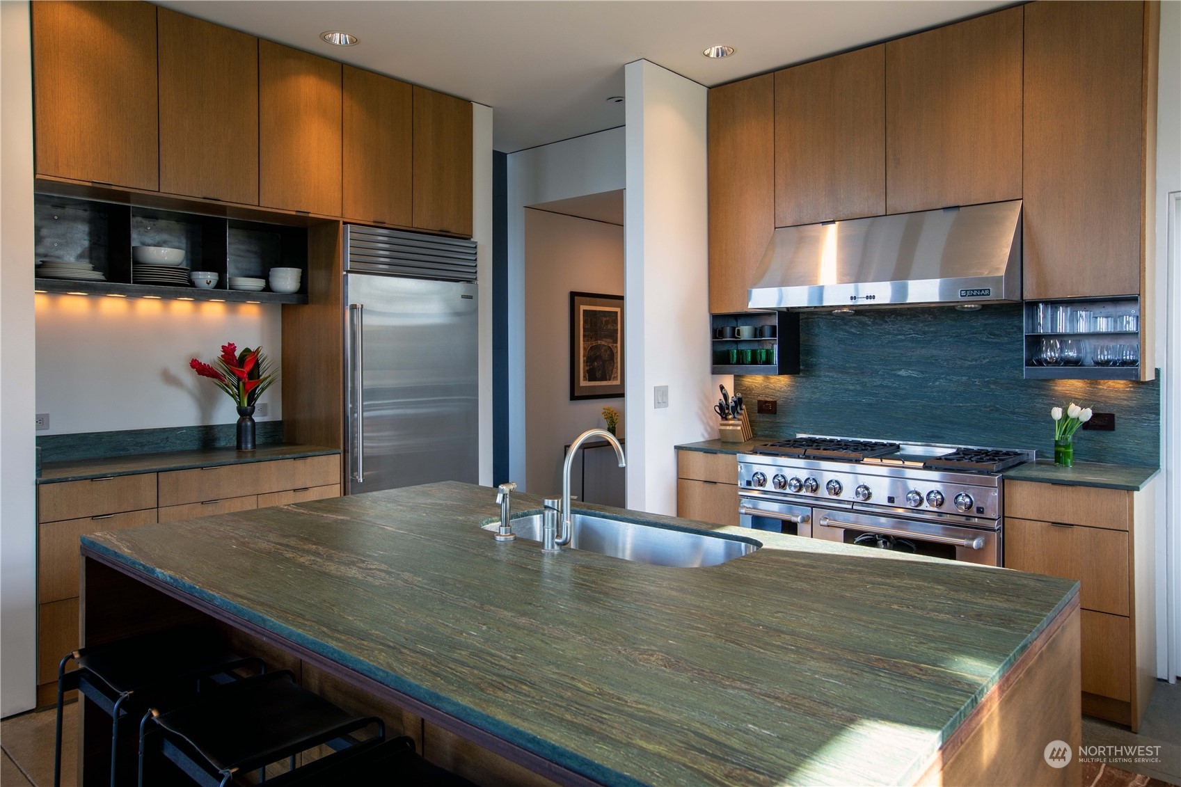 265 Rainshadow Road San Juan Island, WA 98250 - Photo 16 of 40 a kitchen with kitchen island a sink appliances and cabinets
