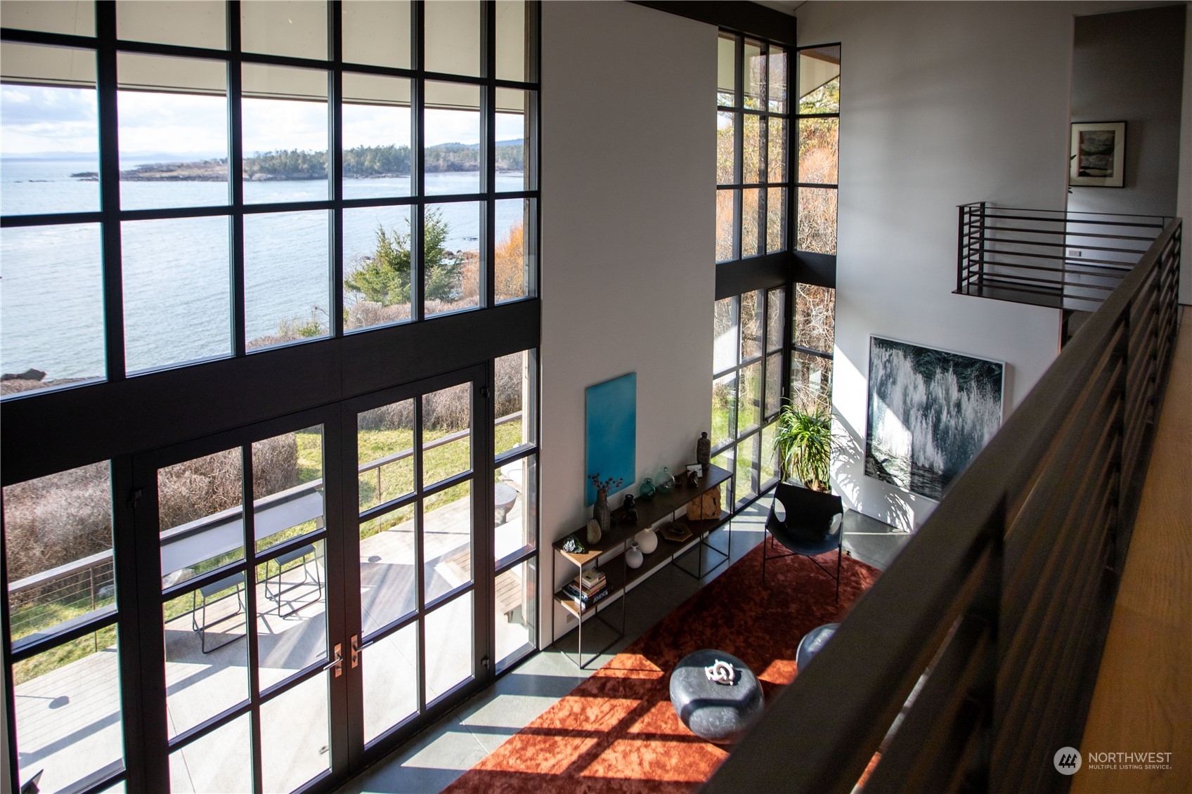 265 Rainshadow Road San Juan Island, WA 98250 - Photo 20 of 40 a room with furniture and a window