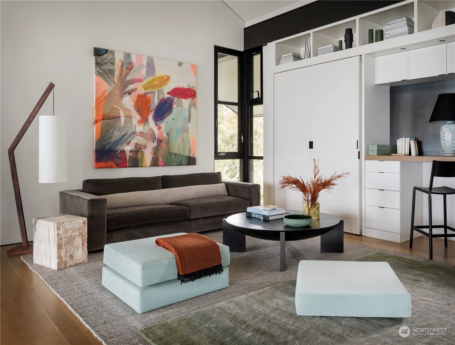 265 Rainshadow Road San Juan Island, WA 98250 - Photo 22 of 40 a living room with furniture and a potted plant
