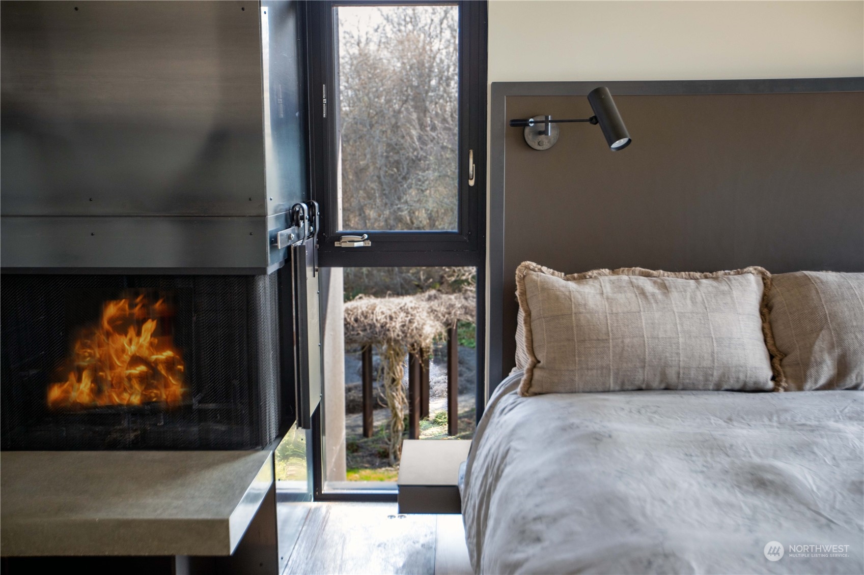 265 Rainshadow Road San Juan Island, WA 98250 - Photo 23 of 40 a living room with furniture and a flat screen tv